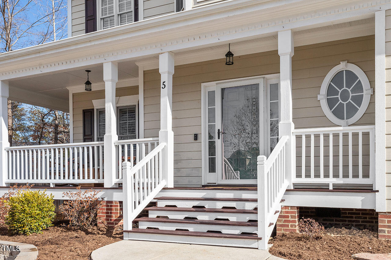 5 Spring Water Lane Durham, NC 27712 - Photo 2 of 32 a front view of a house with a large window