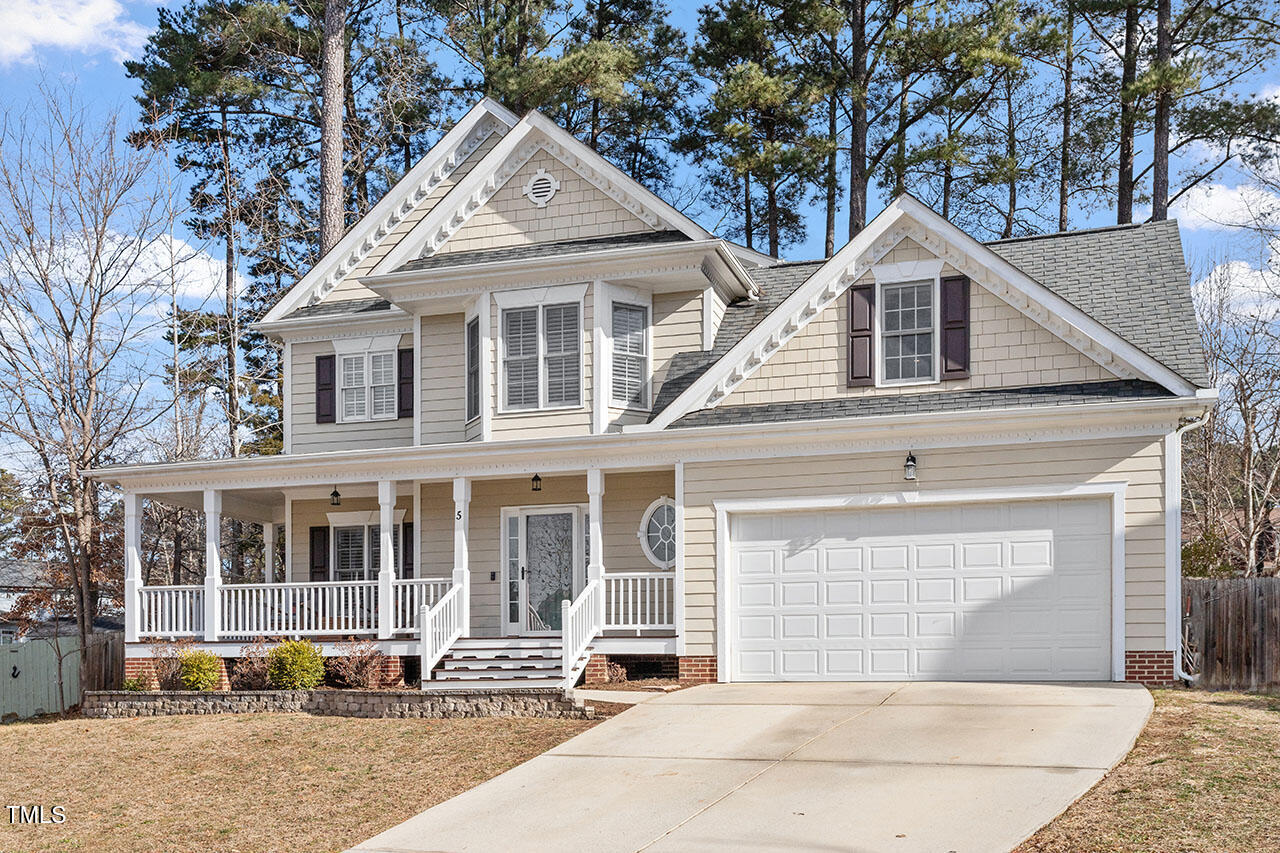 5 Spring Water Lane Durham, NC 27712 - Photo 32 of 32 a front view of a house with a yard and garage