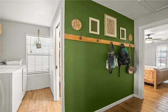 a view of a hallway and interior of the house