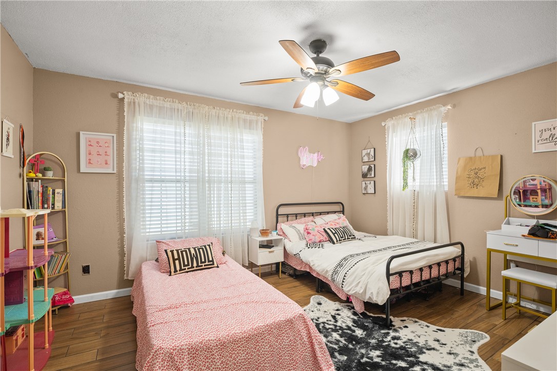 167 Trail Ridge Drive Sandia, TX 78383 - Photo 22 of 33 a bedroom with two beds and a window