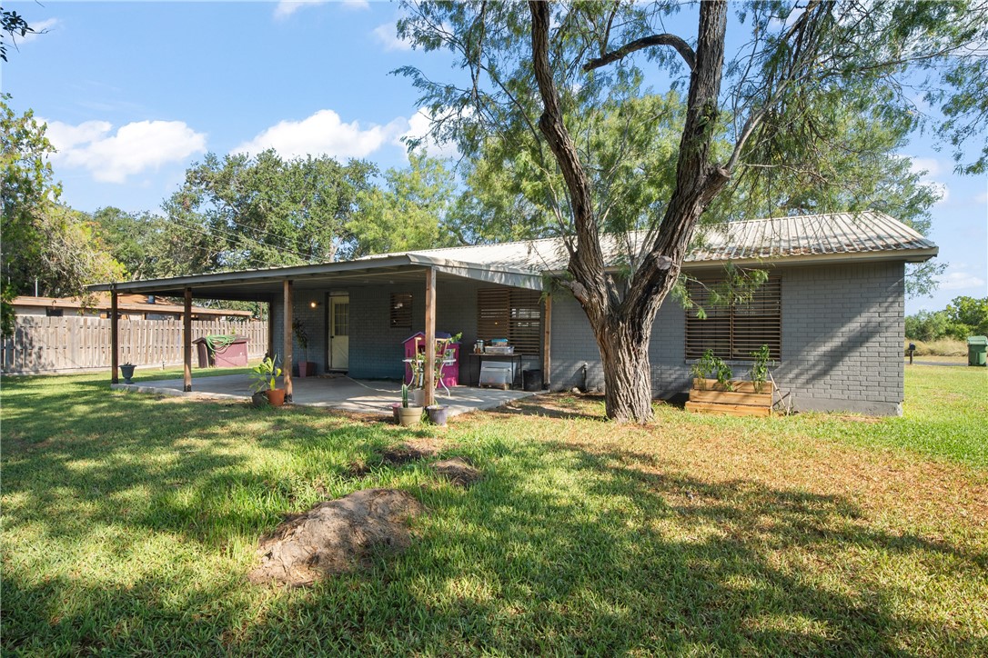 167 Trail Ridge Drive Sandia, TX 78383 - Photo 24 of 33 a large tree in middle of the house