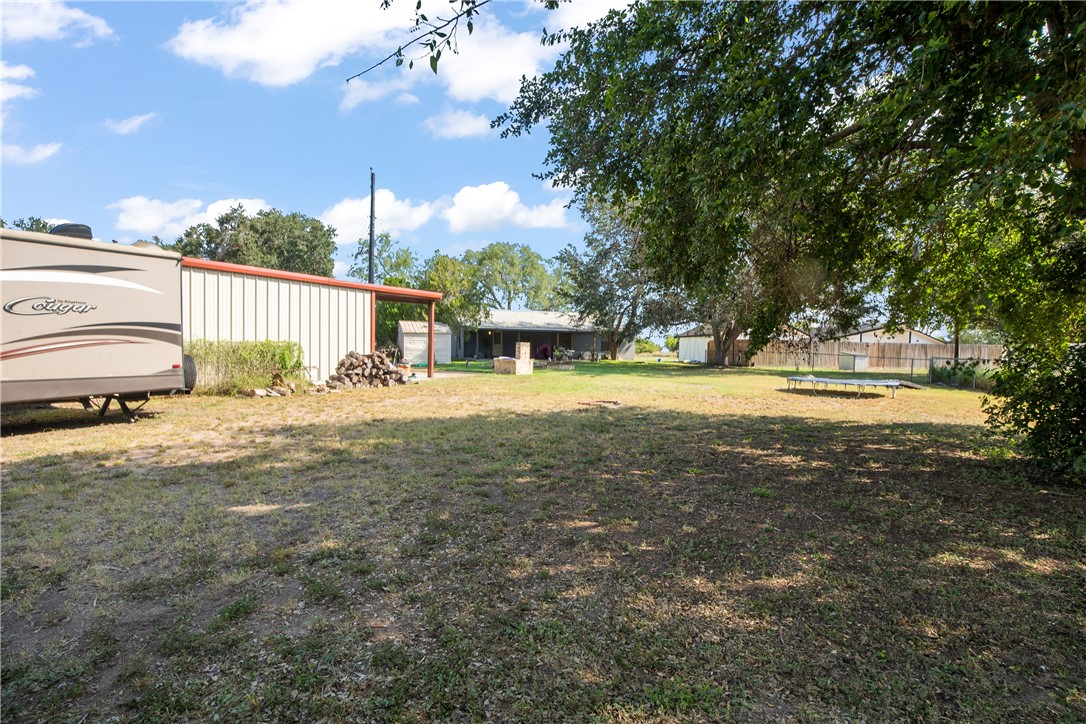 167 Trail Ridge Drive Sandia, TX 78383 - Photo 29 of 33 a view of a yard with swimming pool and sitting area