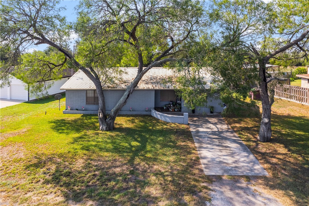 167 Trail Ridge Drive Sandia, TX 78383 - Photo 4 of 33 a front view of a house with garden