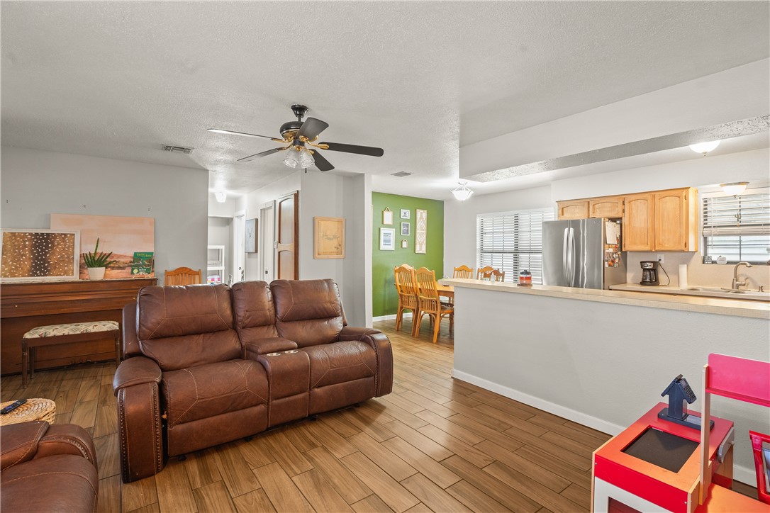 167 Trail Ridge Drive Sandia, TX 78383 - Photo 7 of 33 a living room with furniture and a large window