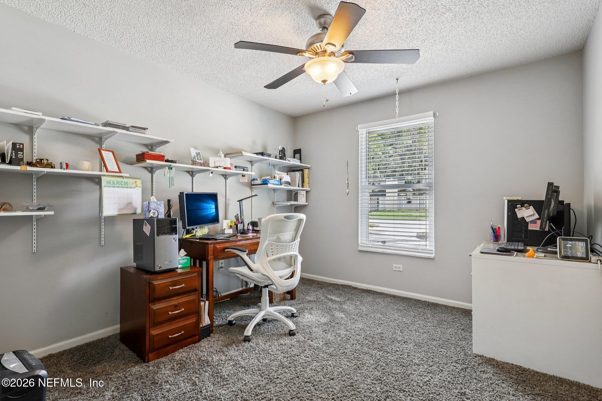 11654 Lake Ride Drive Jacksonville, FL 32223 - Photo 26 of 36 a dining room with furniture and window