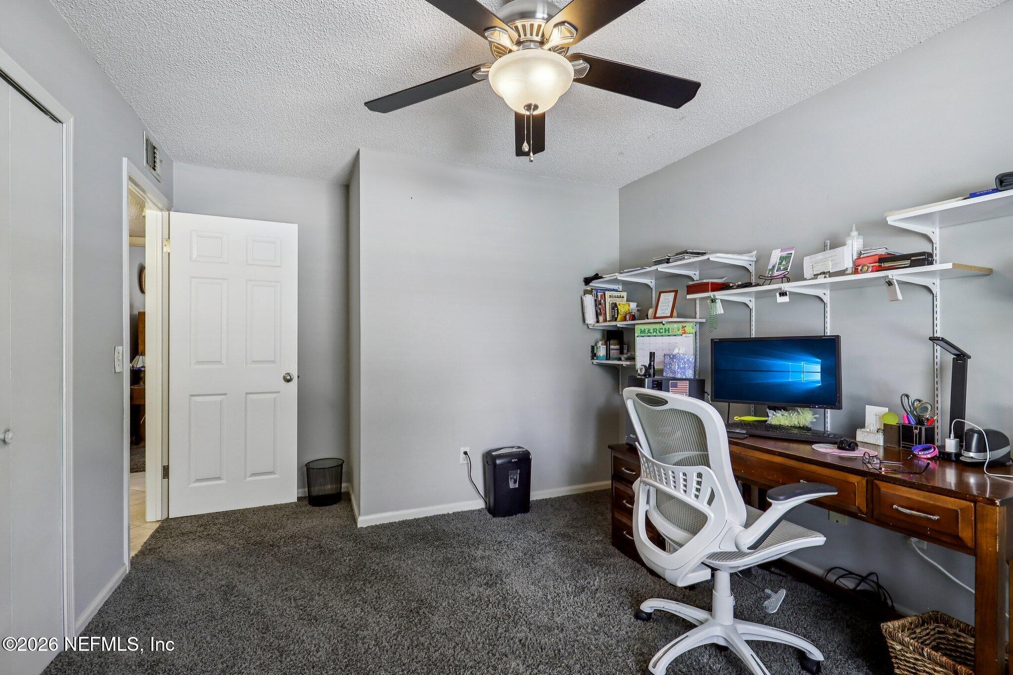 11654 Lake Ride Drive Jacksonville, FL 32223 - Photo 27 of 36 a workspace with a workspace