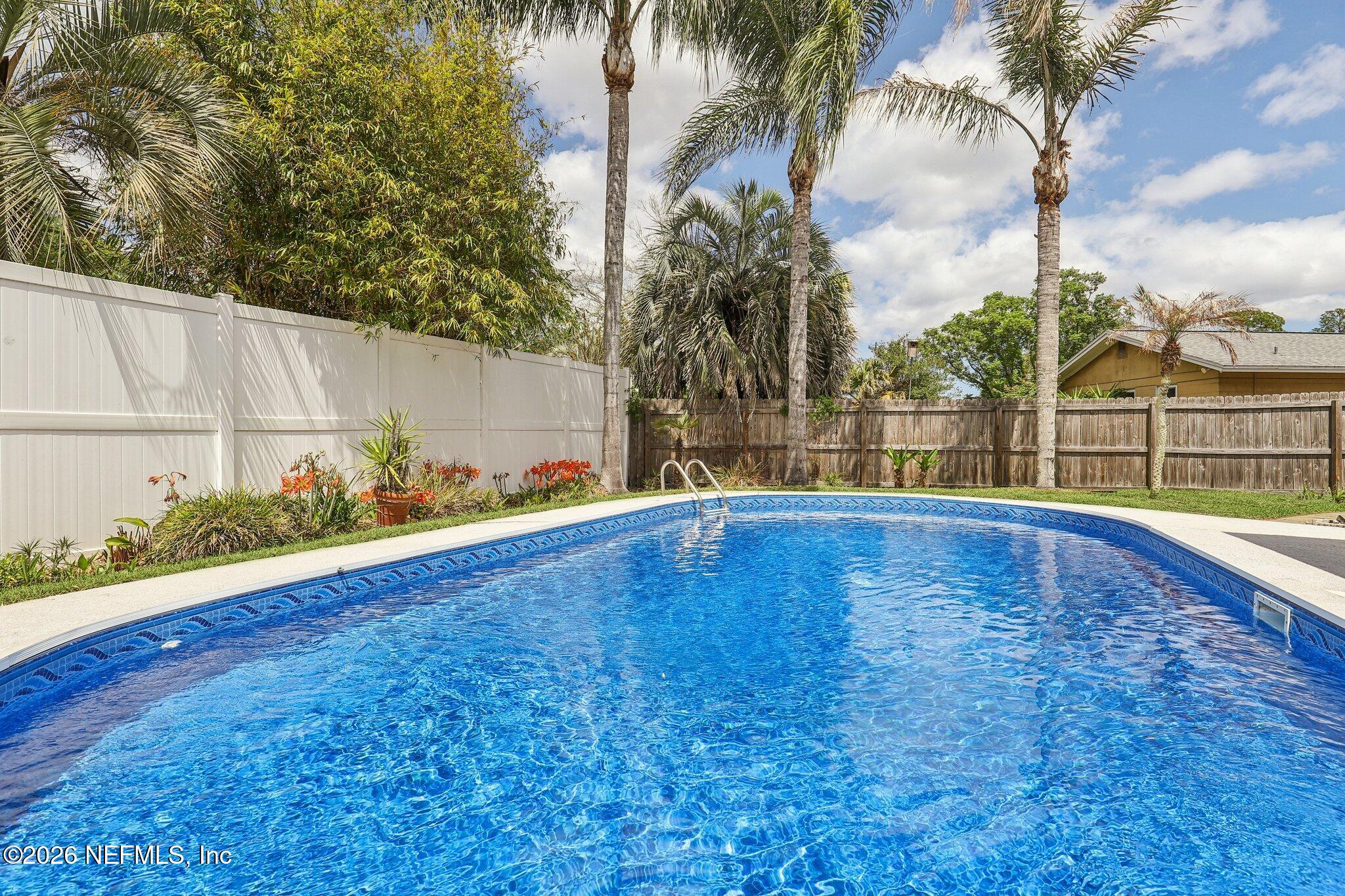 11654 Lake Ride Drive Jacksonville, FL 32223 - Photo 35 of 36 a view of outdoor space with swimming pool