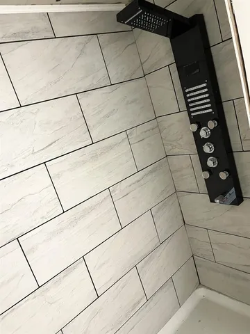 a view of livingroom and hardwood floor