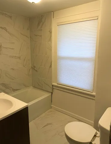 a bathroom with a sink and a toilet