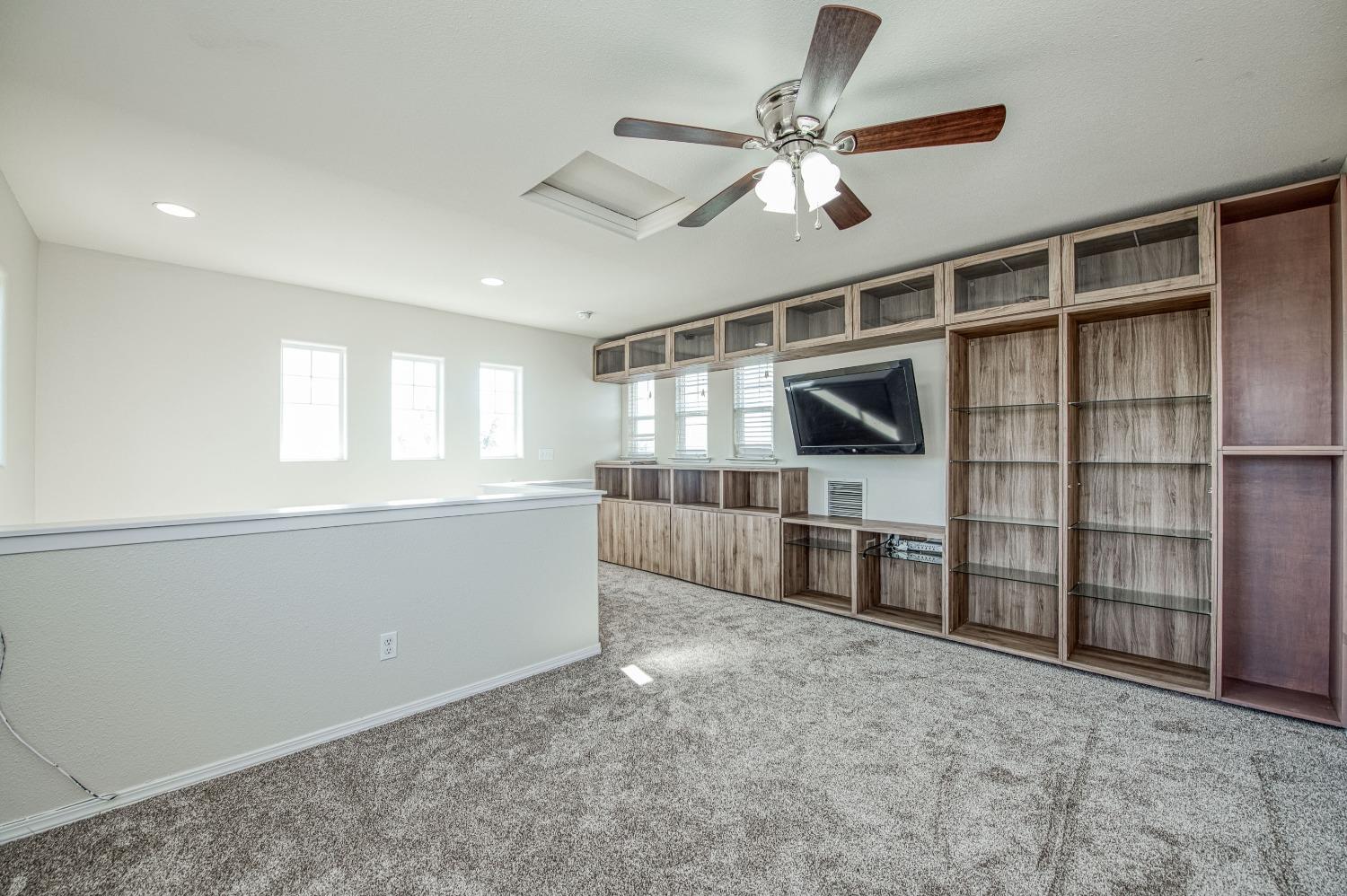 3991 Harlan Ranch Boulevard Clovis, CA 93619 - Photo 16 of 21 a view of a livingroom with furniture and a window