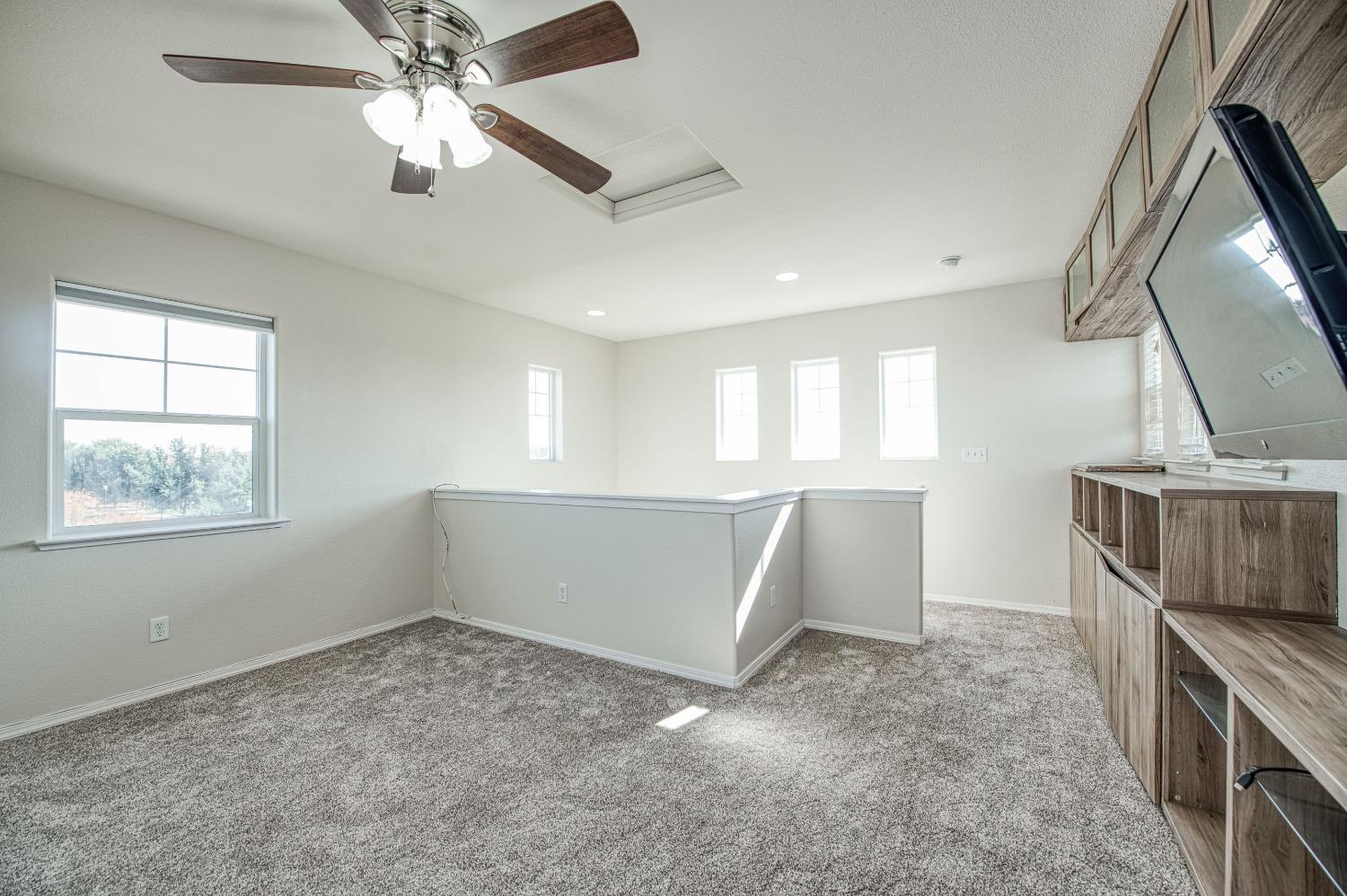 3991 Harlan Ranch Boulevard Clovis, CA 93619 - Photo 17 of 21 a view of an empty room with a window