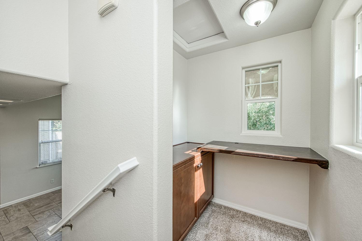 3991 Harlan Ranch Boulevard Clovis, CA 93619 - Photo 4 of 21 a view of storage and utility room with a window