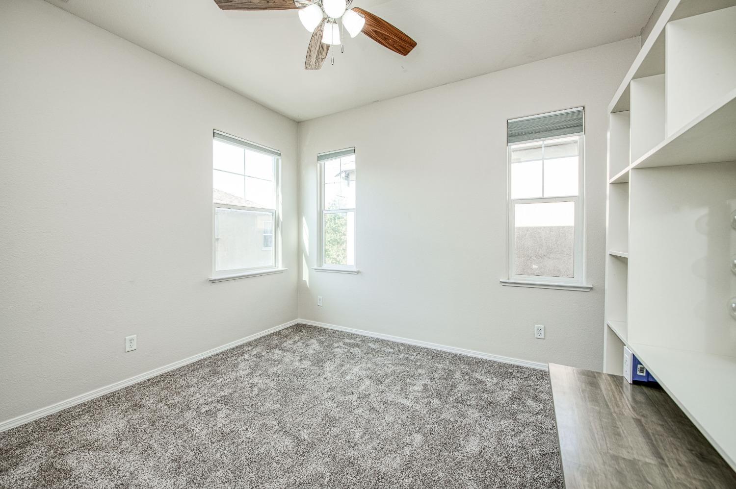 3991 Harlan Ranch Boulevard Clovis, CA 93619 - Photo 10 of 21 an empty room with a window
