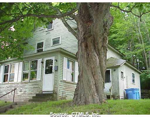 117 Stillson Road Waterbury, CT 06705 - Photo 1 of 1 a front view of a house with a yard
