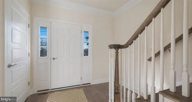 a view of an entryway with staircase