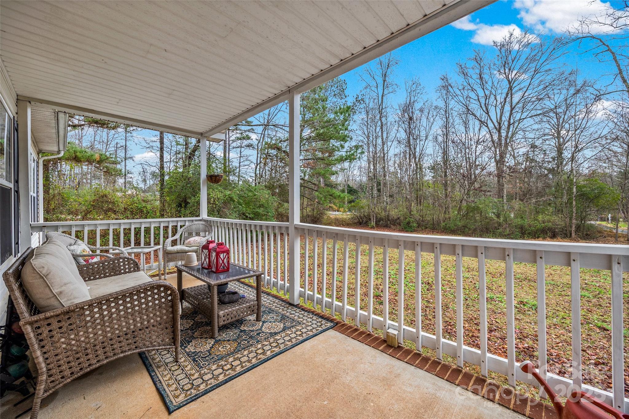 332 Sutton Spring Road York, SC 29745 - Photo 2 of 21 a view of roof deck with furniture