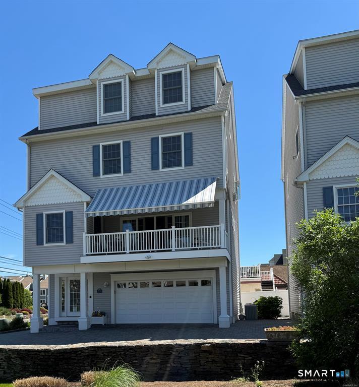 77 Merwin Avenue, Unit A Milford, CT 06460 - Photo 2 of 39 a view of a large building with many windows