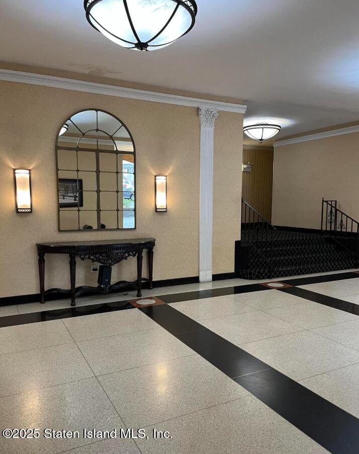1000 Clove Road, Unit 4P Staten Island, NY 10301 - Photo 5 of 25 a view of a livingroom with furniture