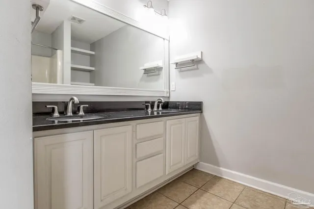 a close view of a sink and a mirror