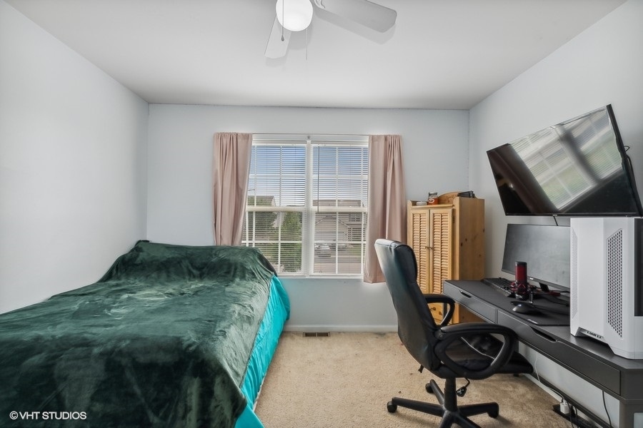 1417 Roth Drive Joliet, IL 60431 - Photo 14 of 18 a workspace with furniture and a window