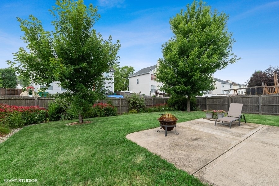 1417 Roth Drive Joliet, IL 60431 - Photo 17 of 18 a park view with potted plants and large trees