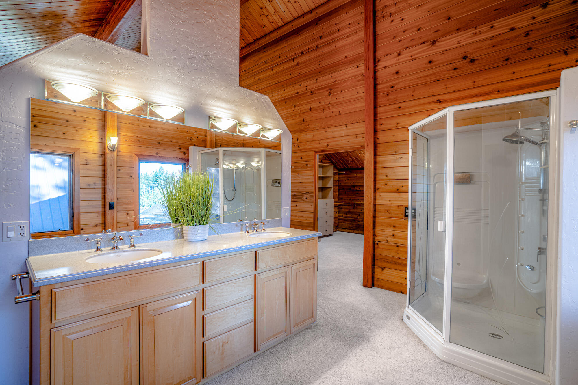 60647 Antler Road Bend, OR 97702 - Photo 26 of 44 a bathroom with a sink and a mirror