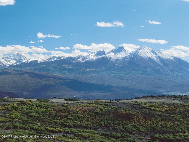 a view of a backyard of a house
