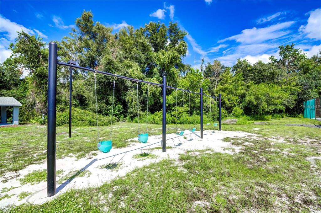 6067 Patricia Place Weeki Wachee, FL 34607 - Photo 13 of 21 a view of a park with large trees