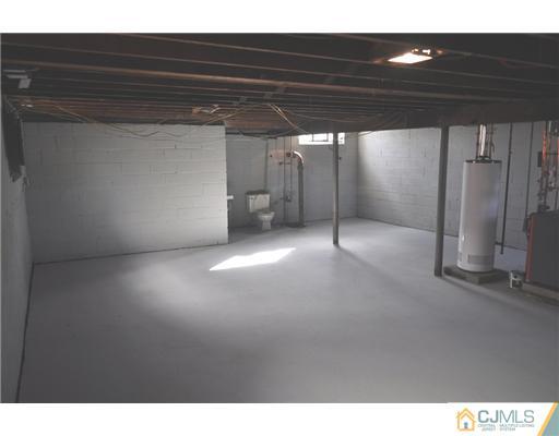 51 Farmingdale Road Fords, NJ 08863 - Photo 5 of 6 a view of a room with wooden floor