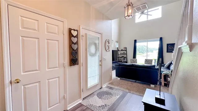 a bed room with a bed and a mirror