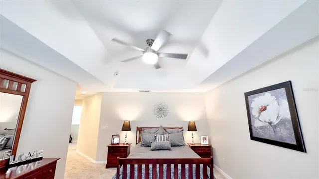 a bedroom with furniture and window