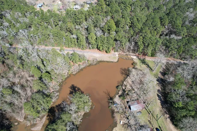 a view of a lake with a yard