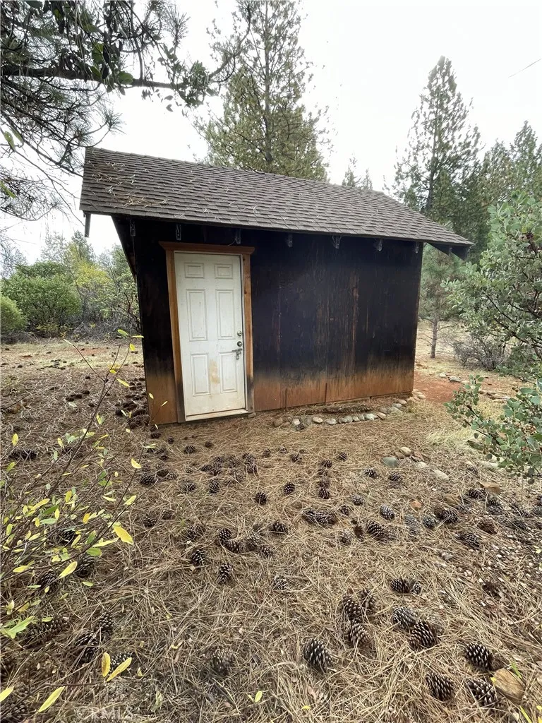 0 Fitzgerald Drive Magalia, CA 95954 - Photo 2 of 3 a stone house with a outdoor space