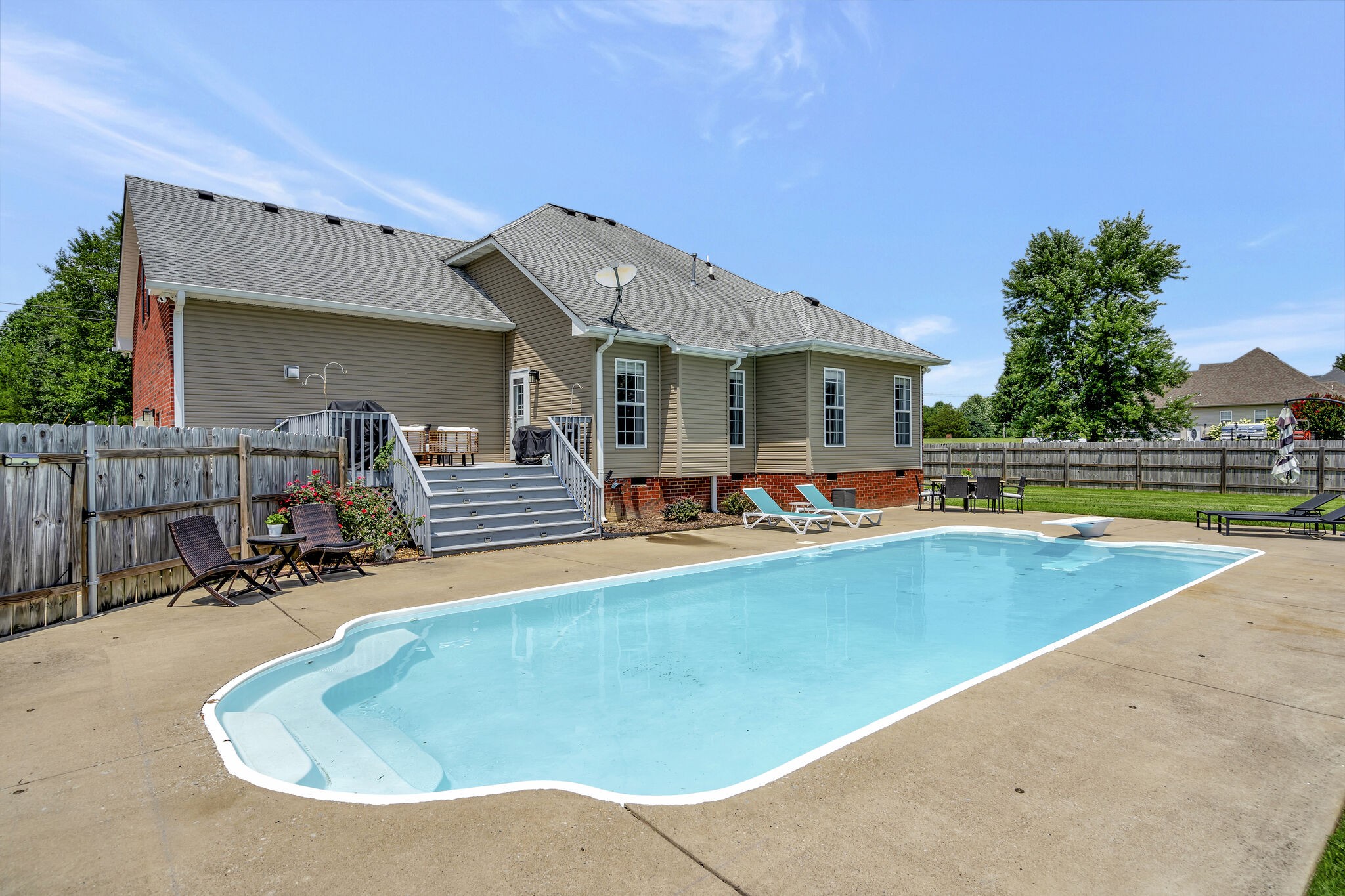 1212 Old Eastside Road Burns, TN 37029 - Photo 31 of 39 a view of a house with swimming pool and sitting area