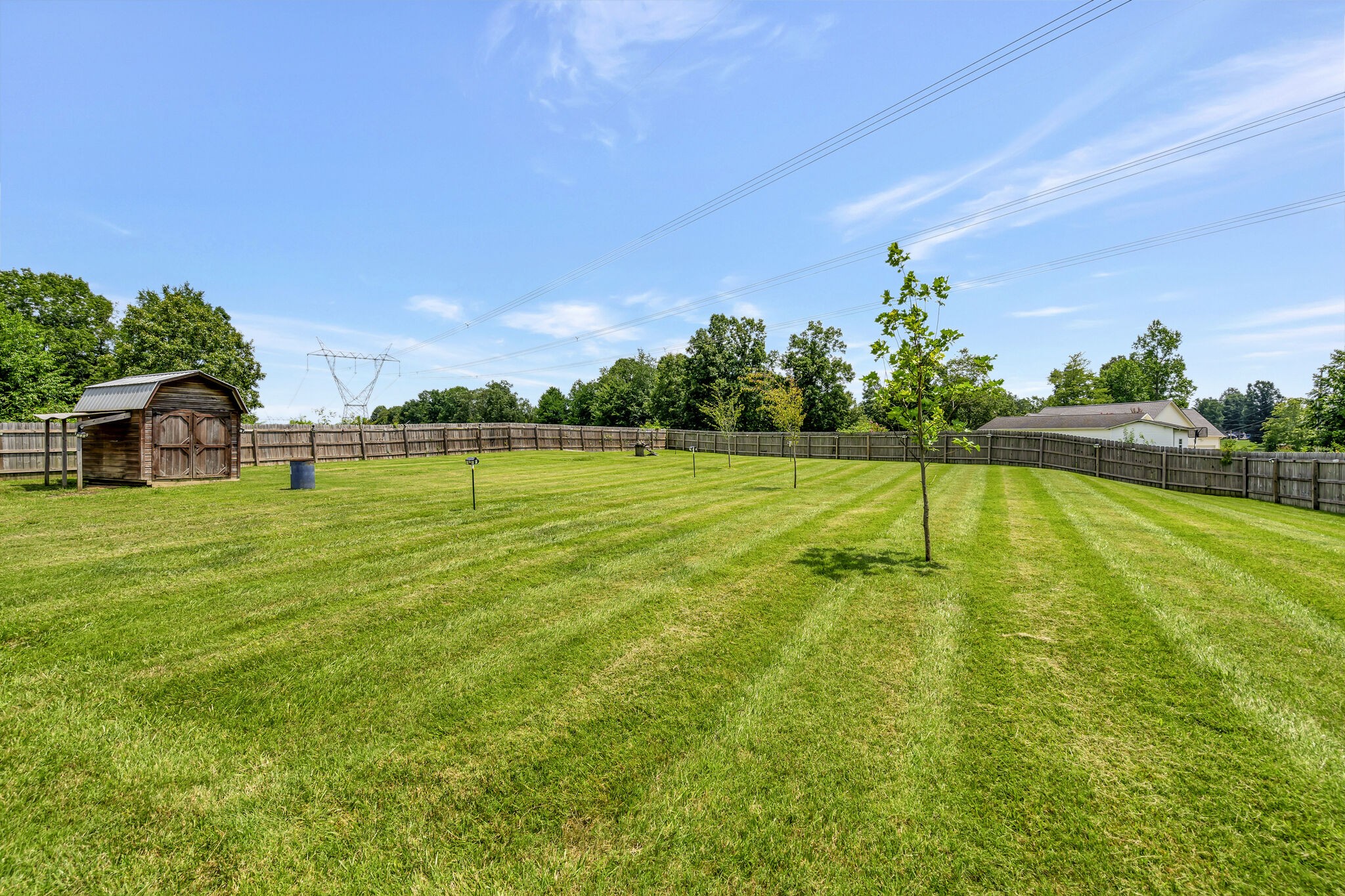1212 Old Eastside Road Burns, TN 37029 - Photo 37 of 39 a swimming pool with lots of tress in it