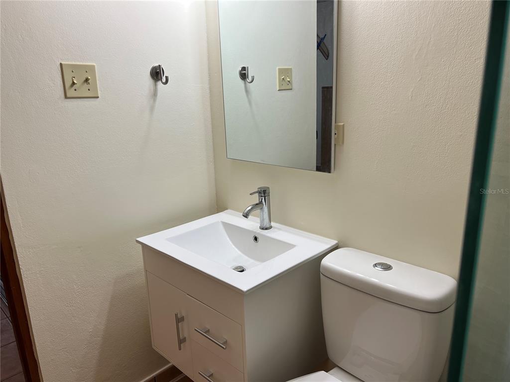 968 Camino Las Picüas, Unit 30 Rio Grande, Río Grande 00745 - Photo 22 of 24 a bathroom with a sink and a toilet