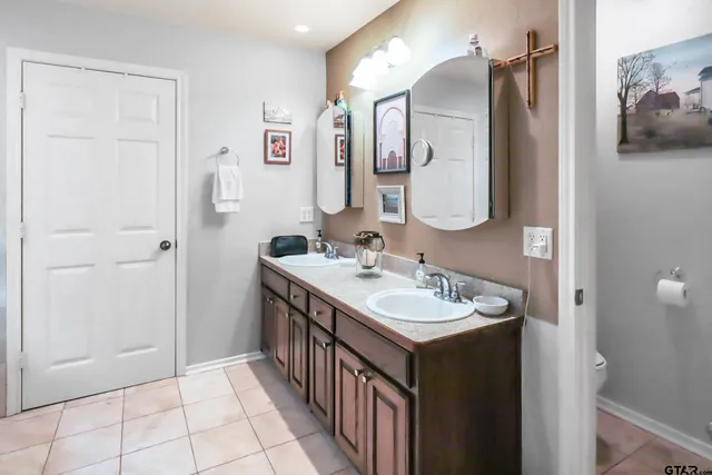 a kitchen with a sink stove top oven and microwave