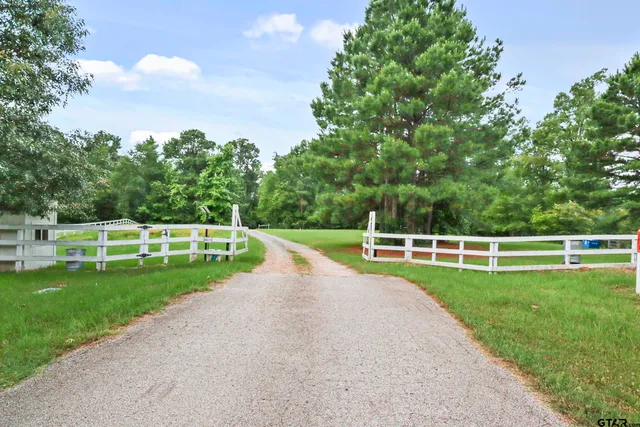 a house with trees in front of it