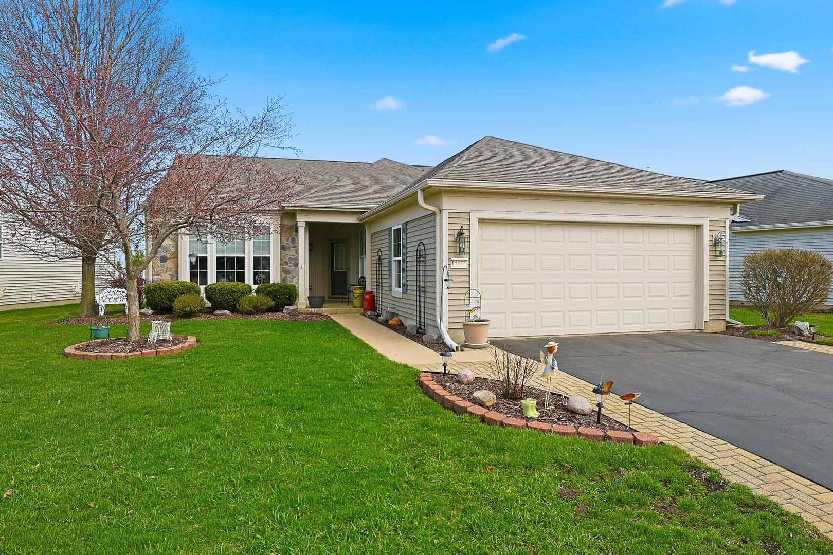 11660 Windsor Drive Huntley, IL 60142 - Photo 1 of 1 a front view of house with yard