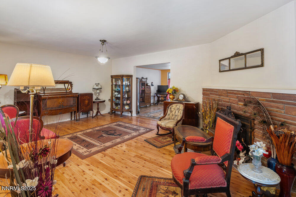 290 Circle Drive Reno, NV 89509 - Photo 5 of 22 a living room with furniture a piano and a flat screen tv