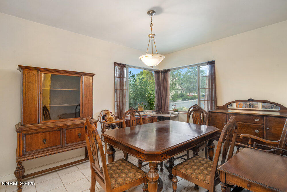 290 Circle Drive Reno, NV 89509 - Photo 9 of 22 a view of a dining room with furniture window and outside view