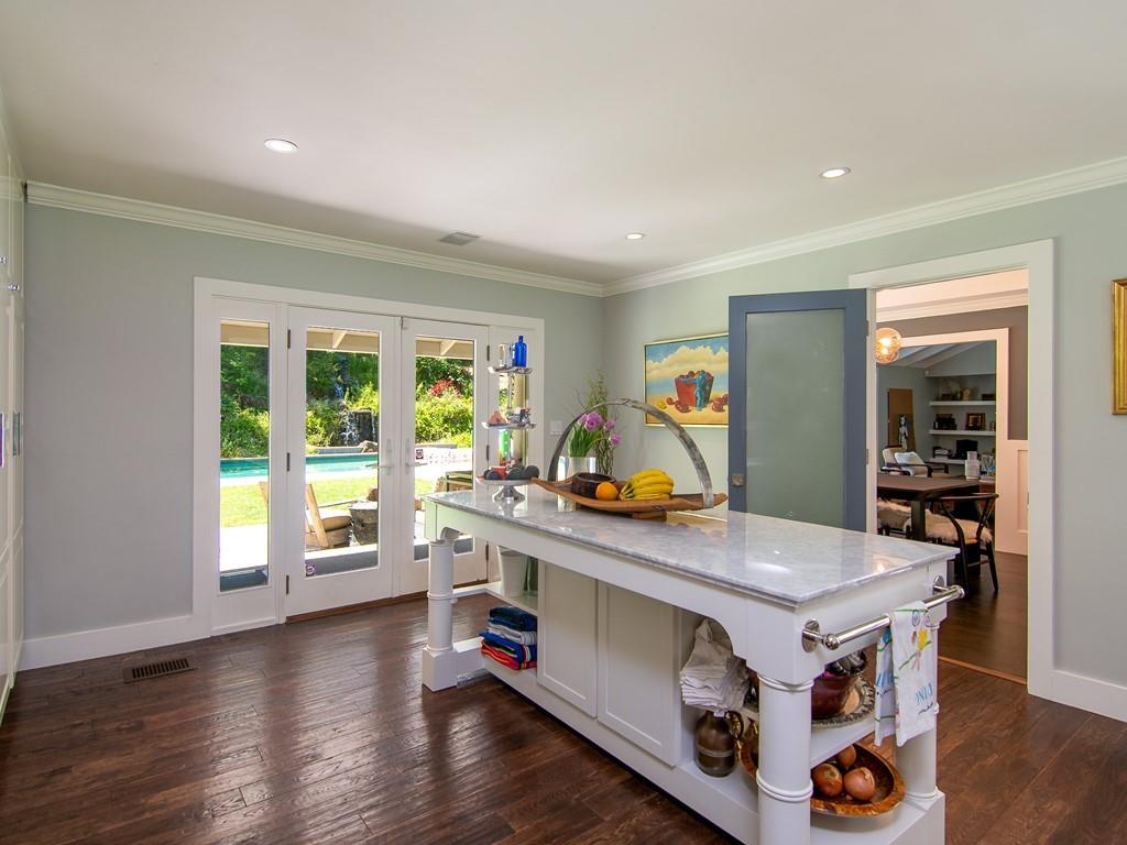 3600 Tripp Road Woodside, CA 94062 - Photo 11 of 27 a view of kitchen with stainless steel appliances granite countertop a stove and a wooden floors