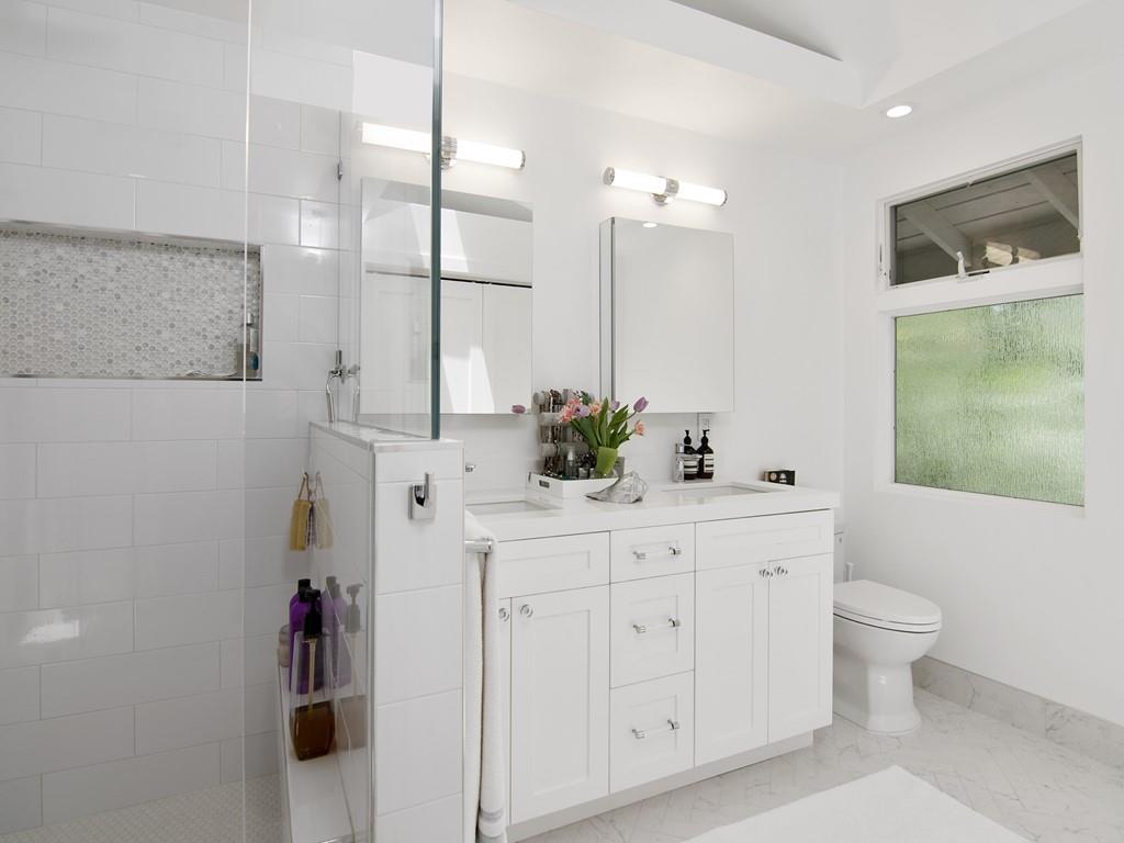 3600 Tripp Road Woodside, CA 94062 - Photo 17 of 27 a spacious bathroom with a double vanity sink a mirror and a shower