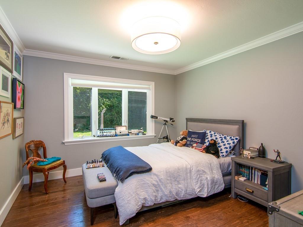 3600 Tripp Road Woodside, CA 94062 - Photo 18 of 27 a bedroom with bed and a large window