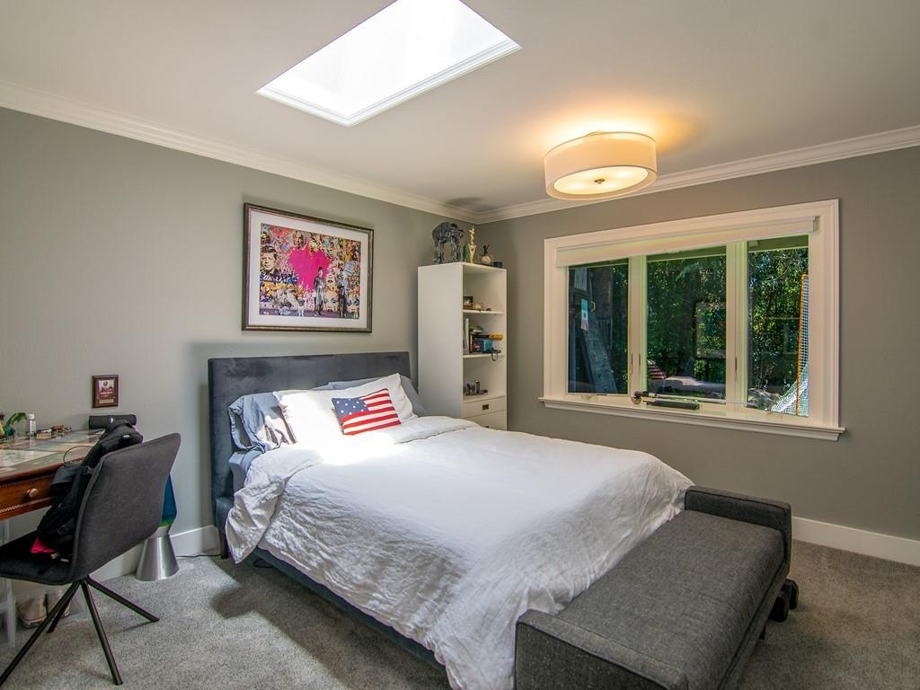 3600 Tripp Road Woodside, CA 94062 - Photo 19 of 27 a bedroom with furniture and a large window