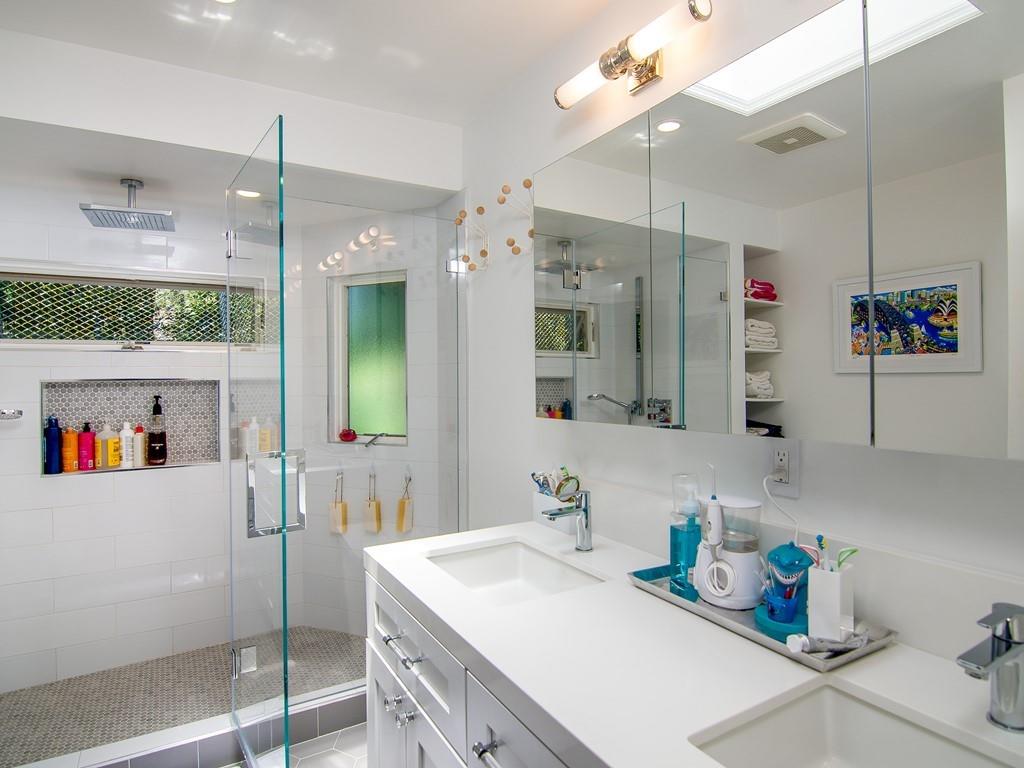 3600 Tripp Road Woodside, CA 94062 - Photo 21 of 27 a bathroom with a sink a mirror and a shower