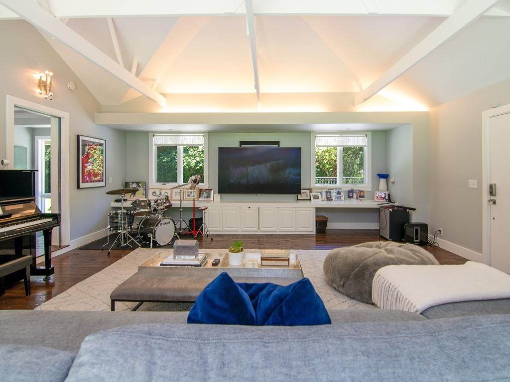 3600 Tripp Road Woodside, CA 94062 - Photo 7 of 27 a living room with furniture and a flat screen tv