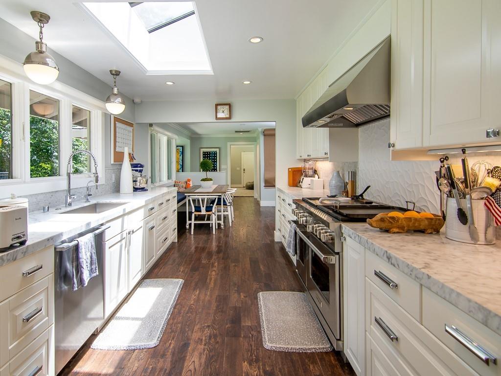 3600 Tripp Road Woodside, CA 94062 - Photo 9 of 27 a kitchen with stainless steel appliances granite countertop lots of counter top space a sink and a stove