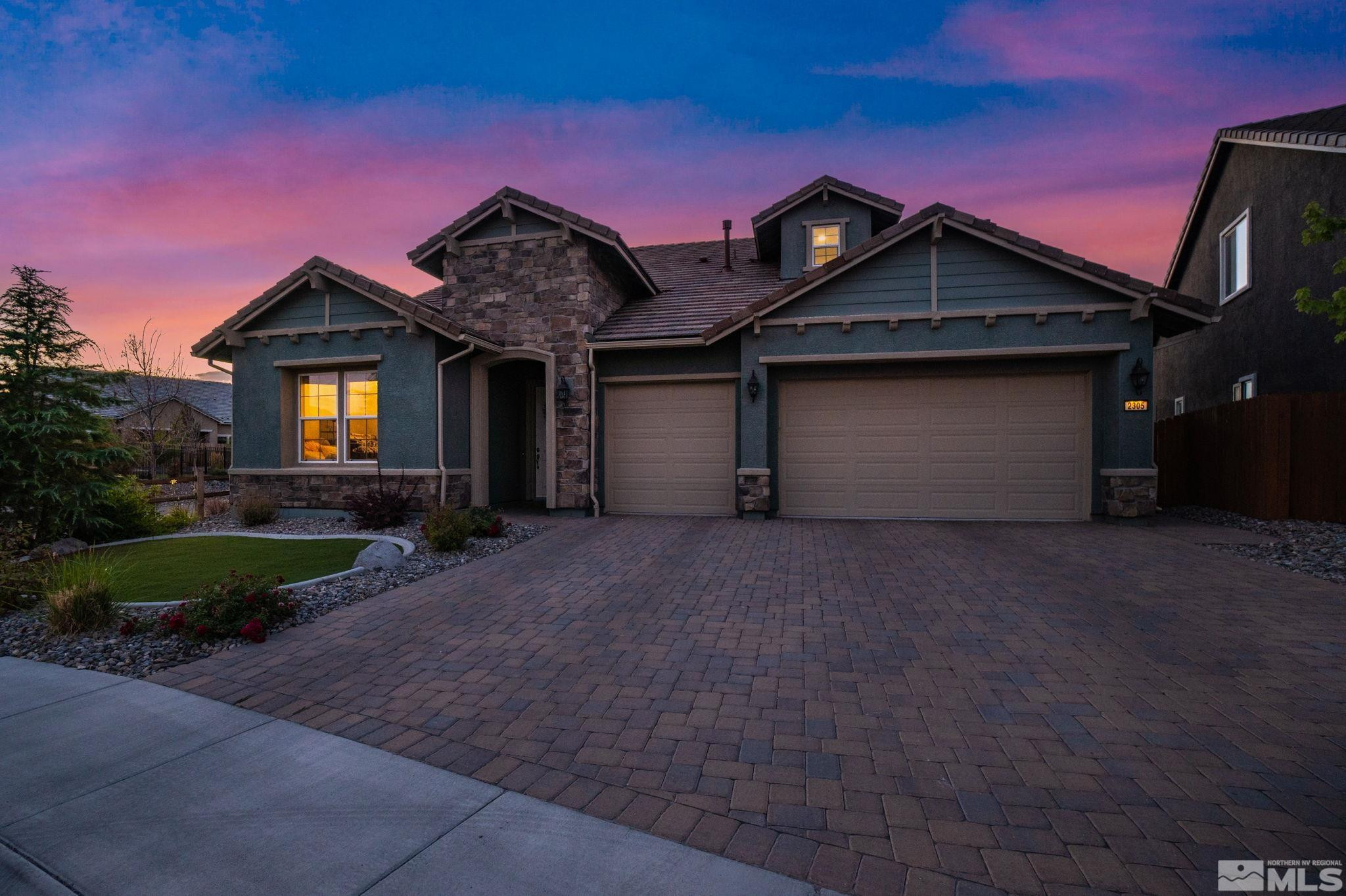 2305 Buttermere Drive Reno, NV 89521 - Photo 1 of 39 a front view of a house with garden