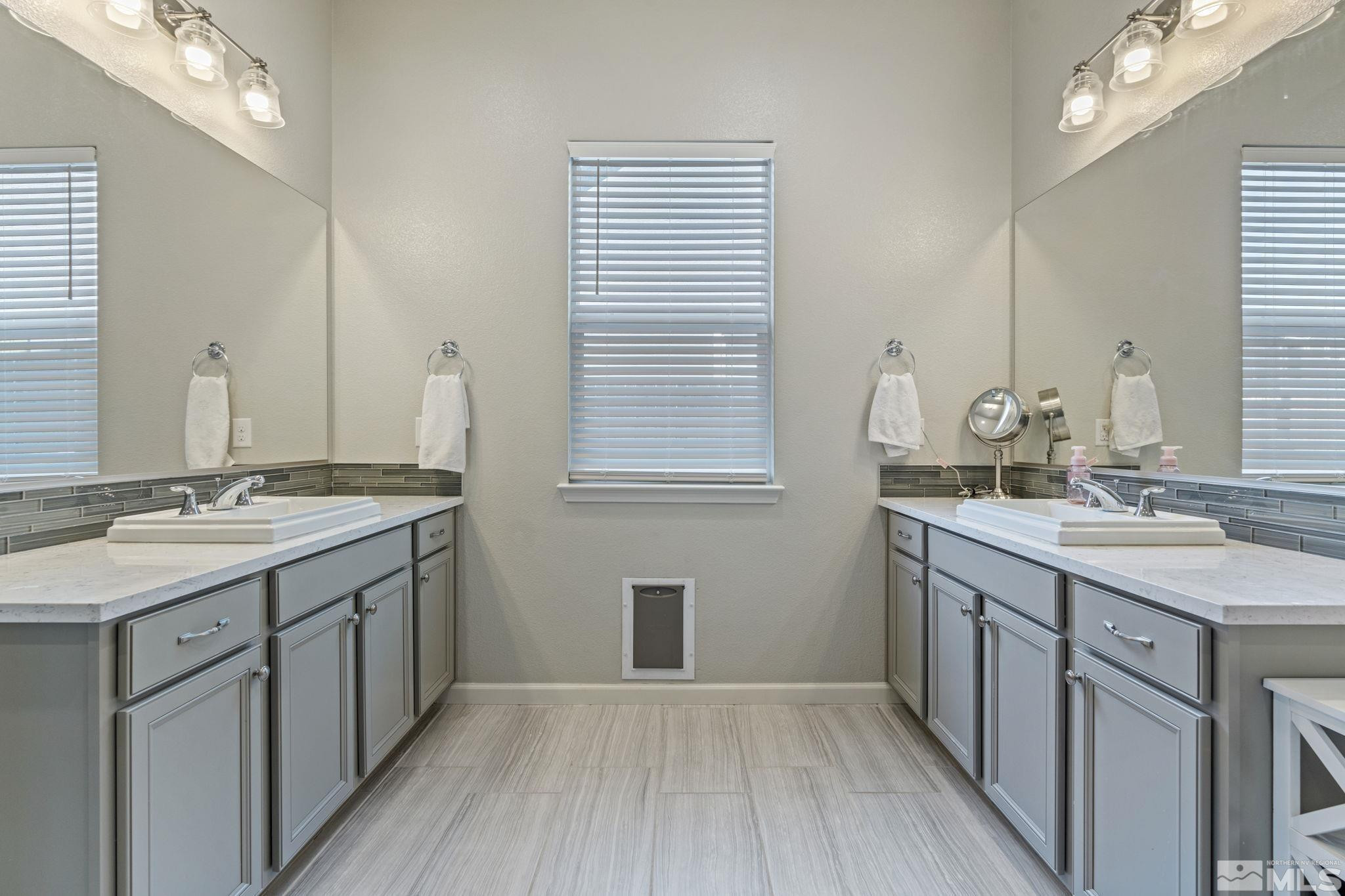 2305 Buttermere Drive Reno, NV 89521 - Photo 20 of 39 a bathroom with a sink and a mirror